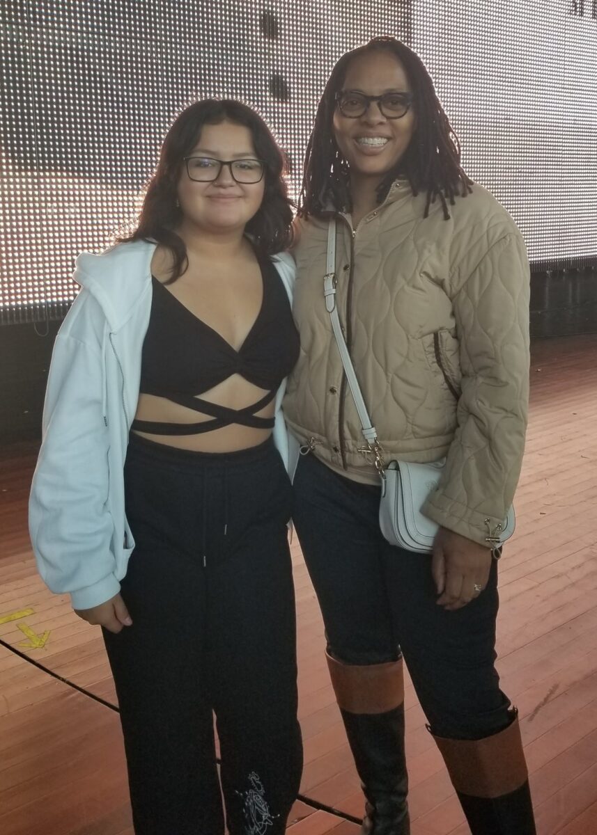Two OhanaHC participants standing together on a backstage tour at Merriweather Post Pavilion