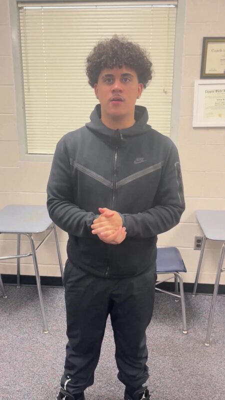 An OhanaHC student in a classroom, about to say why he chose OhanaHC