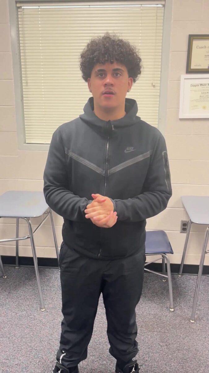 An OhanaHC student in a classroom, about to say why he chose OhanaHC