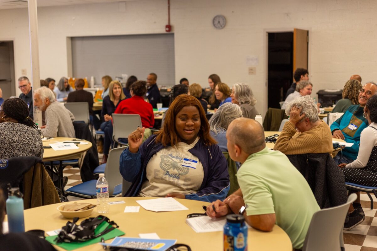 OhanaHC mentors at round tables during a mentor training session