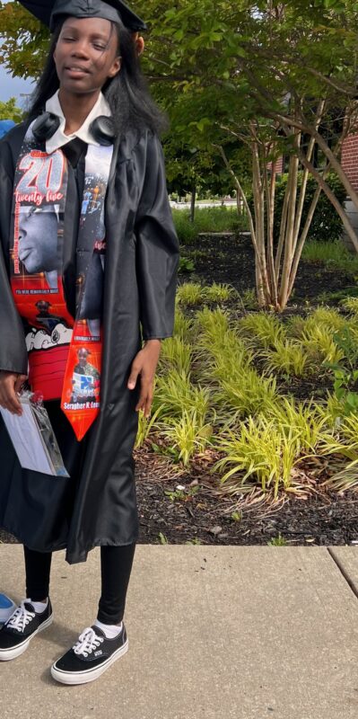 Serapher in her cap and gown on her graduation day from Oakland Mills