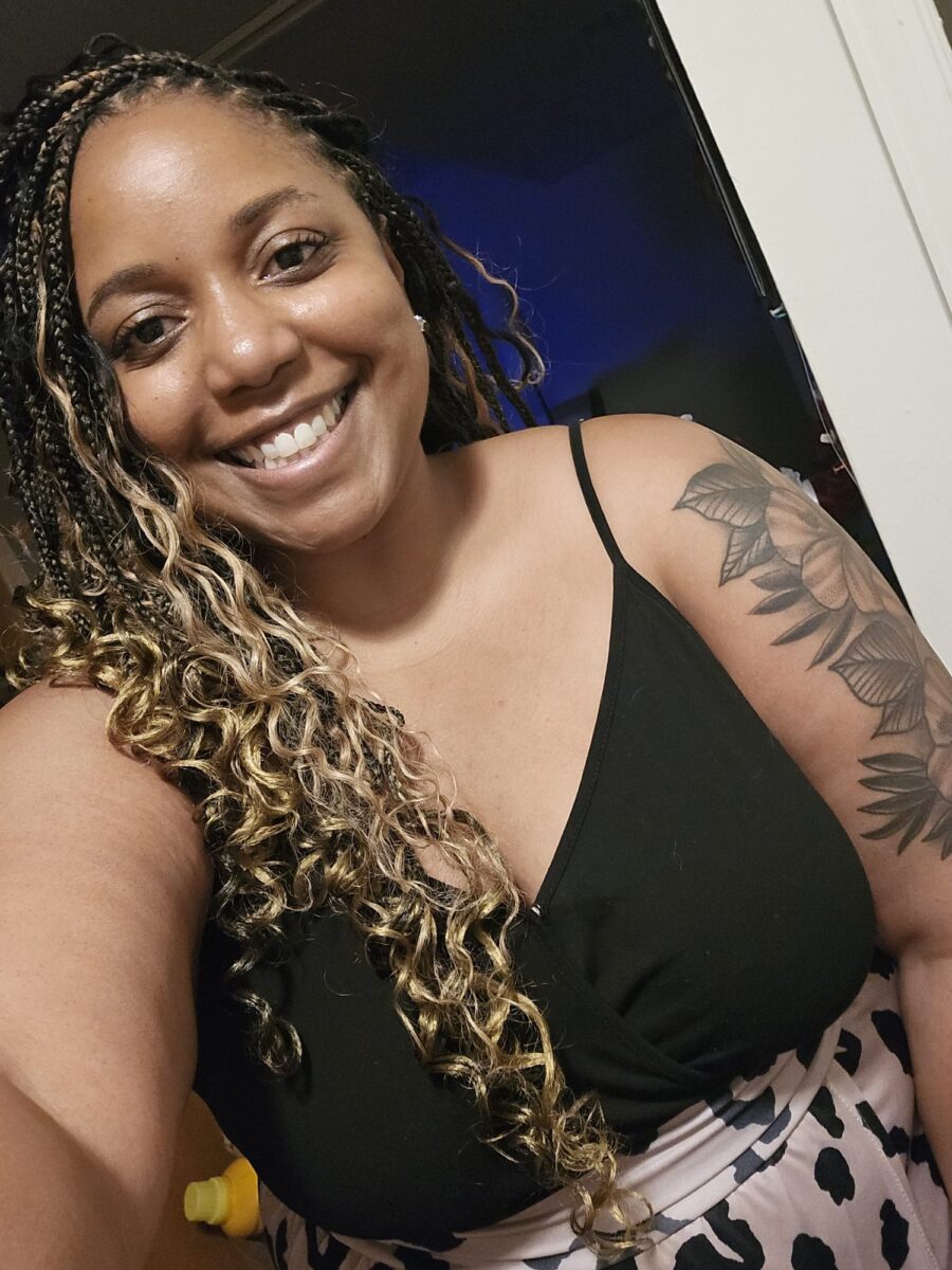 Taylor Ellerbe, an OhanaHC volunteer, smiling